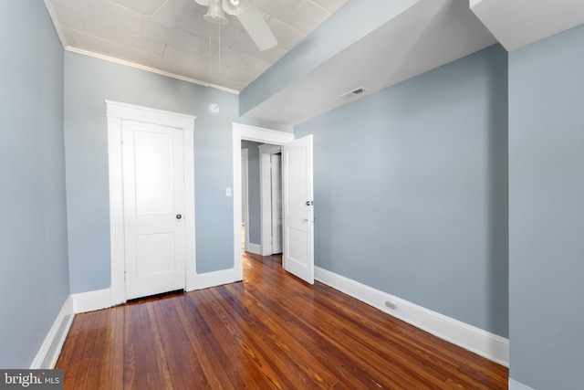 2808 Presstman St, Baltimore, MD 21216 - unfurnished bedroom with baseboards, hardwood / wood-style flooring, and crown molding