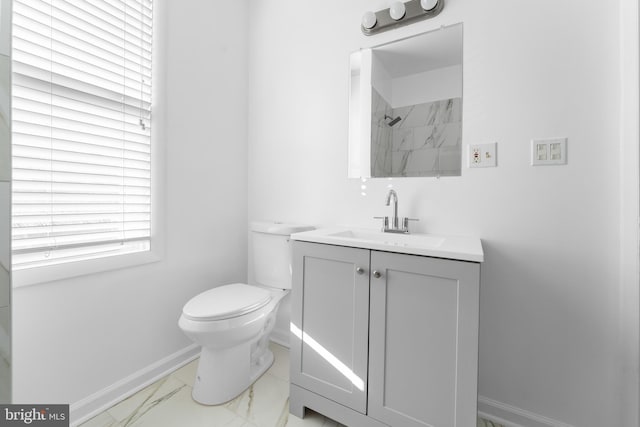 2808 Presstman St, Baltimore, MD 21216 - full bath featuring toilet, vanity, marble finish floors, baseboards, and a shower