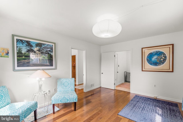 206 Mountain Rd, Linthicum Heights, MD 21090 - living area featuring wood finished floors and baseboards