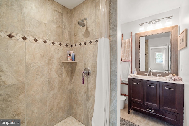206 Mountain Rd, Linthicum Heights, MD 21090 - bathroom featuring tiled shower, vanity, and toilet