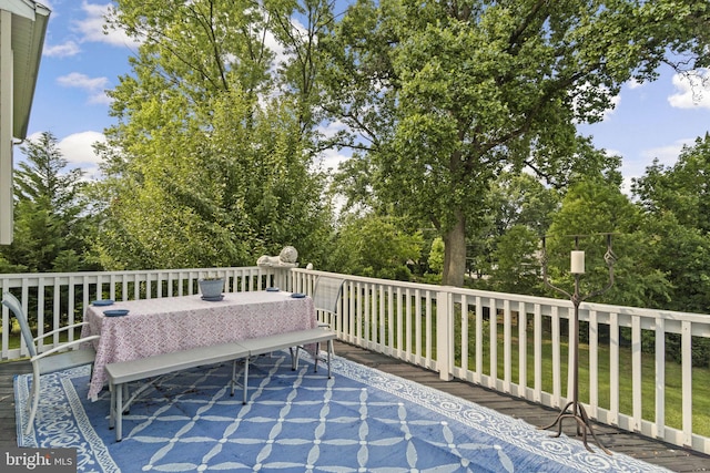 206 Mountain Rd, Linthicum Heights, MD 21090 - wooden deck featuring outdoor dining area and view of wooded area