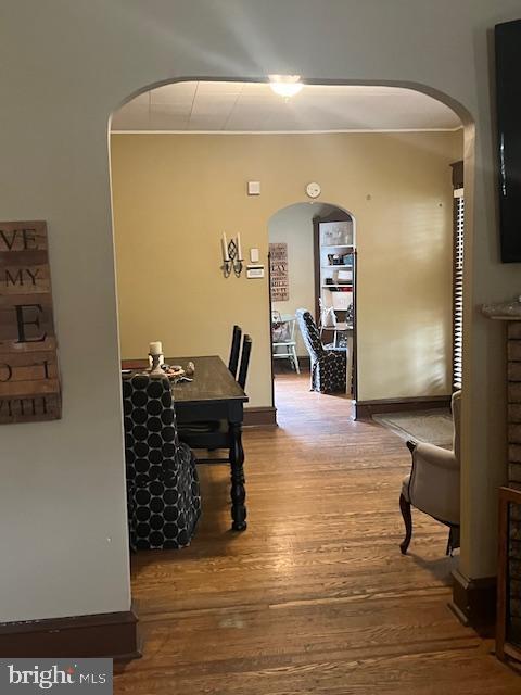 4327 Disston St, Philadelphia, PA 19135 - hallway with wood finished floors and arched walkways
