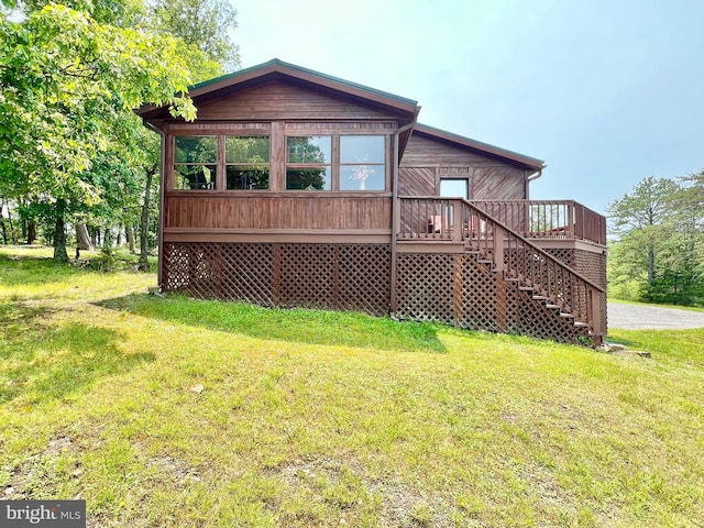 299 Valentine Acres Rd, Clearville, PA 15535 - back of house featuring a lawn, a wooden deck, and stairs