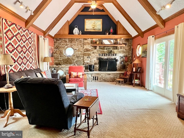 299 Valentine Acres Rd, Clearville, PA 15535 - living room featuring rail lighting, a fireplace, carpet floors, beam ceiling, and a ceiling fan