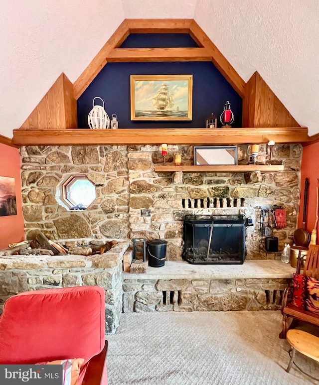 299 Valentine Acres Rd, Clearville, PA 15535 - living room with vaulted ceiling, a textured ceiling, and a fireplace