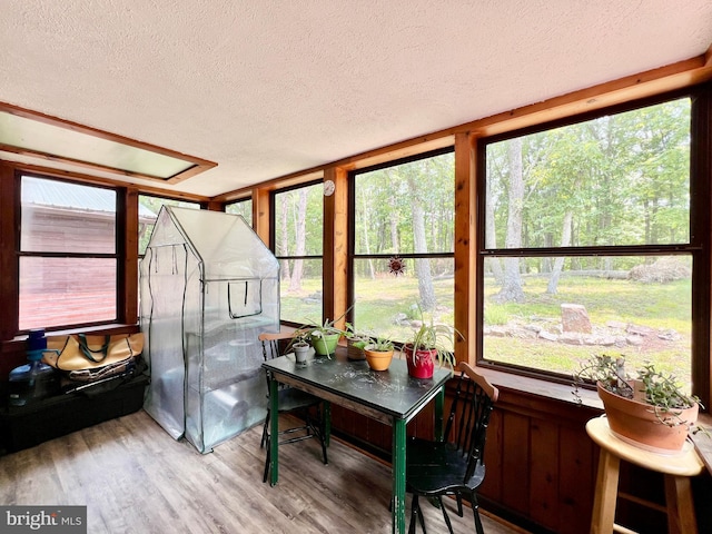 299 Valentine Acres Rd, Clearville, PA 15535 - sunroom / solarium featuring a textured ceiling, wood finished floors, and healthy amount of natural light