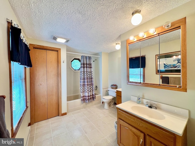 299 Valentine Acres Rd, Clearville, PA 15535 - bathroom featuring vanity, toilet, shower / bath combo, tile patterned flooring, and a textured ceiling