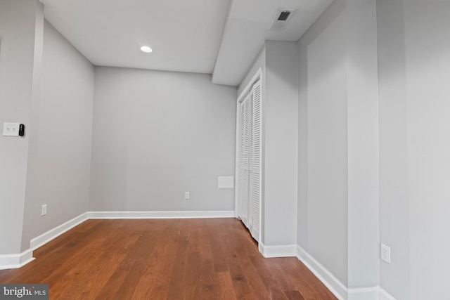 1619 Moreland Ave, Baltimore, MD 21216 - unfurnished bedroom featuring hardwood / wood-style floors, a closet, baseboards, and recessed lighting