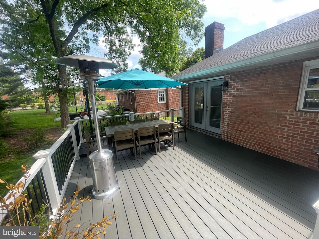 4440 Wells Pkwy, Hyattsville, MD 20782 - wooden terrace featuring outdoor dining area