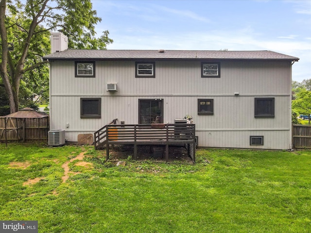 11815 Oriole Dr, Hagerstown, MD 21742 - back of house with central AC, a wooden deck, a chimney, and roof with shingles