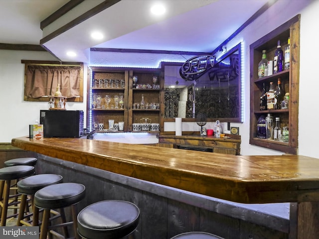 11815 Oriole Dr, Hagerstown, MD 21742 - indoor dry bar featuring recessed lighting and built in shelves