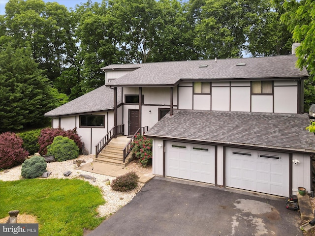 11815 Oriole Dr, Hagerstown, MD 21742 - view of front facade with roof with shingles, driveway, and a chimney