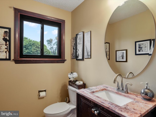 11815 Oriole Dr, Hagerstown, MD 21742 - bathroom with toilet, vanity, and a textured ceiling
