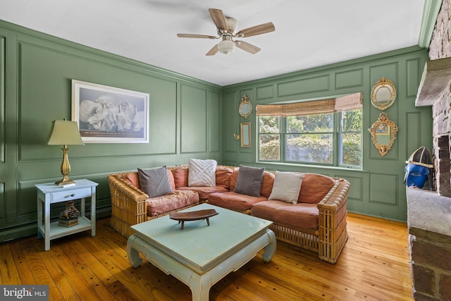 65 Covered Bridge Rd, New Hope, PA 18938 - living area with a decorative wall, a ceiling fan, and light wood finished floors