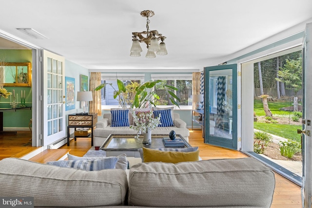65 Covered Bridge Rd, New Hope, PA 18938 - sunroom with a chandelier and french doors