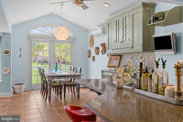 65 Covered Bridge Rd, New Hope, PA 18938 - dining space featuring a wall mounted AC, ceiling fan, light tile patterned floors, and vaulted ceiling