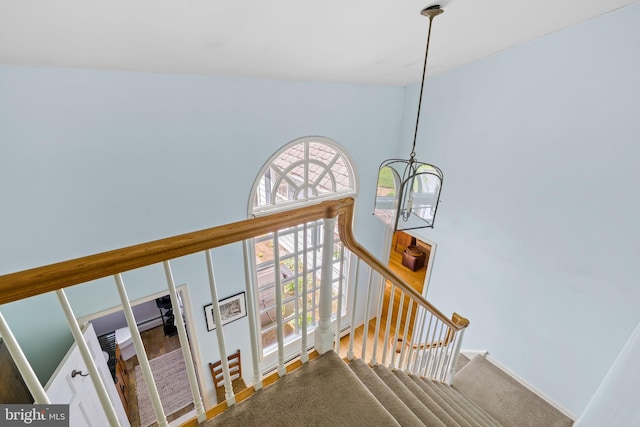 65 Covered Bridge Rd, New Hope, PA 18938 - stairs featuring a chandelier and a towering ceiling