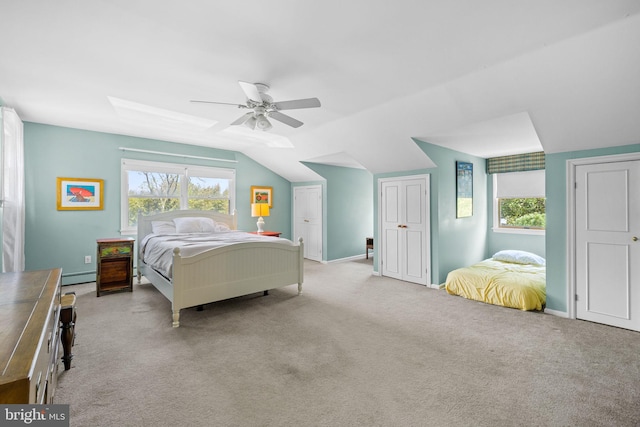 65 Covered Bridge Rd, New Hope, PA 18938 - carpeted bedroom featuring a baseboard radiator, a skylight, lofted ceiling, ceiling fan, and baseboards