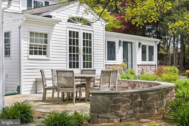 65 Covered Bridge Rd, New Hope, PA 18938 - view of patio with french doors and outdoor dining area