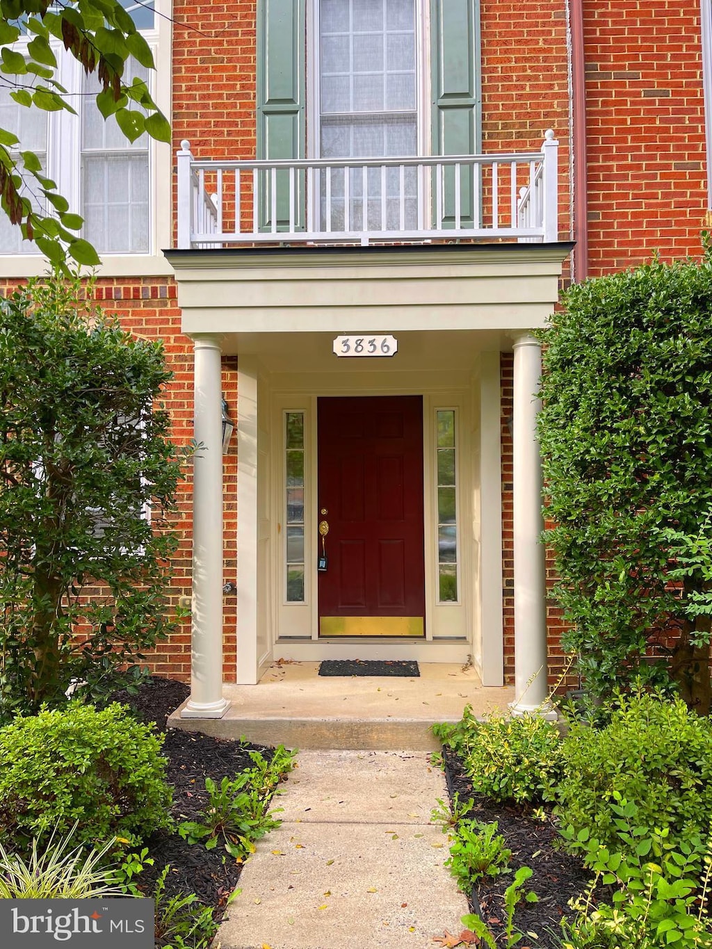 3836 Sugarloaf Pkwy, Frederick, MD 21704 - doorway to property featuring a balcony and brick siding