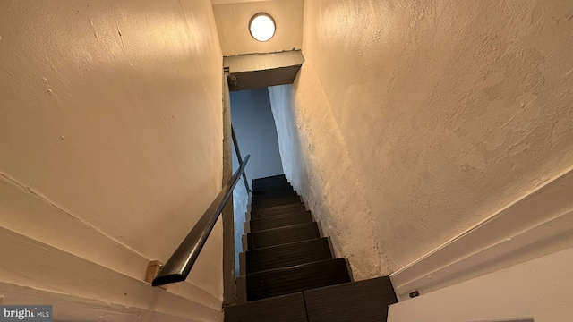2126 E Sanger St, Philadelphia, PA 19124 - stairs with a textured wall