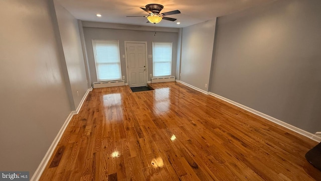 2126 E Sanger St, Philadelphia, PA 19124 - entryway with a baseboard heating unit, wood finished floors, a ceiling fan, and recessed lighting