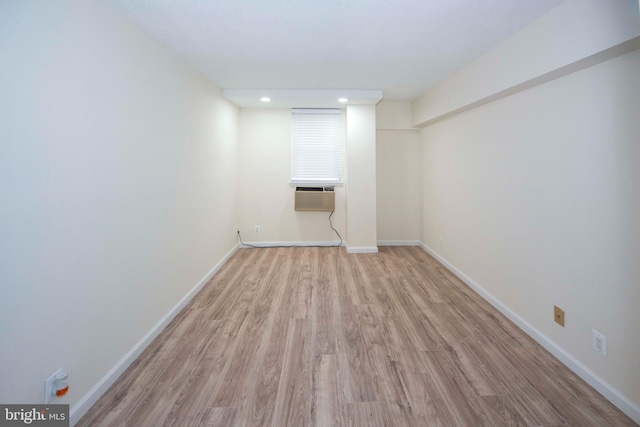 2030 N Adams St Unit 509, Arlington, VA 22201 - below grade area with light wood-type flooring, baseboards, recessed lighting, and cooling unit