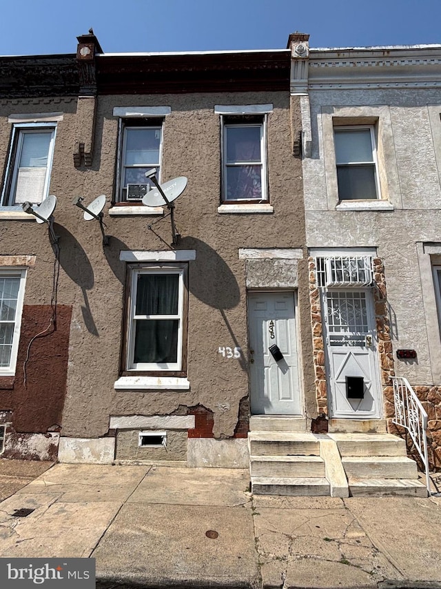 435 E Elkhart St, Philadelphia, PA 19134 - townhome / multi-family property with entry steps and stucco siding