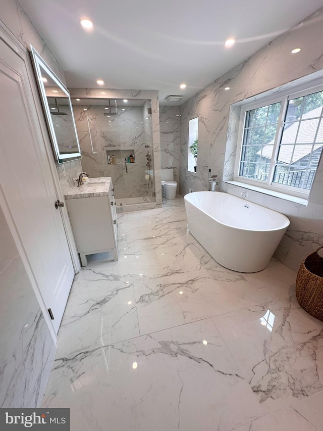 1319 Remington Rd, Wynnewood, PA 19096 - full bathroom with a marble finish shower, vanity, marble tiled flooring, a freestanding tub, and recessed lighting