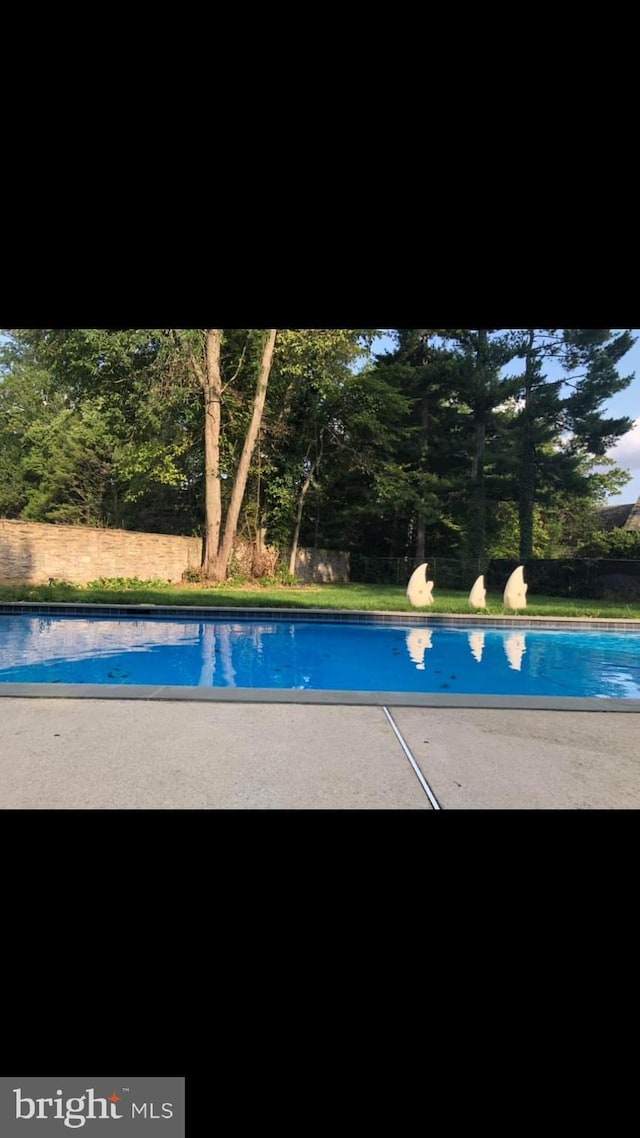 1319 Remington Rd, Wynnewood, PA 19096 - swimming pool featuring a patio area