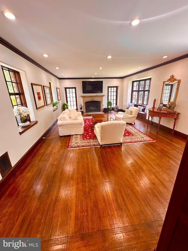 1319 Remington Rd, Wynnewood, PA 19096 - living room with hardwood / wood-style floors, crown molding, a fireplace, recessed lighting, and baseboards