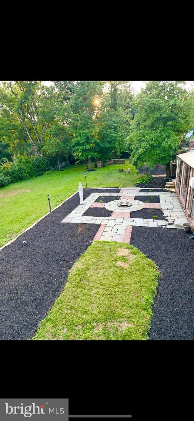 1319 Remington Rd, Wynnewood, PA 19096 - view of green lawn featuring a patio