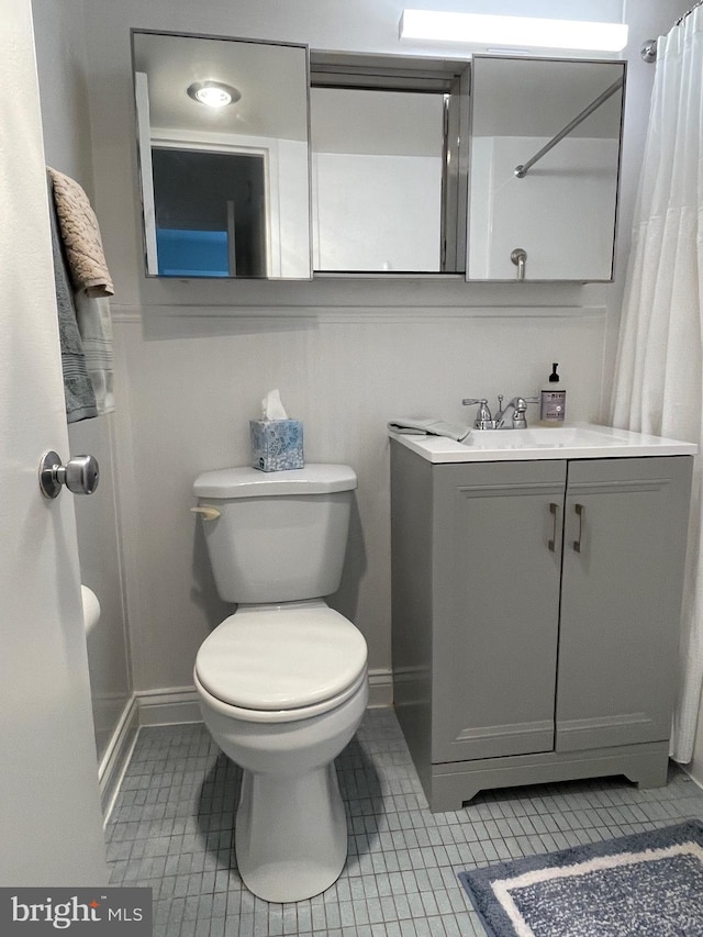 510 N Street Street SW Unit N223, Washington, DC 20024 - bathroom featuring toilet, tile patterned floors, vanity, and baseboards