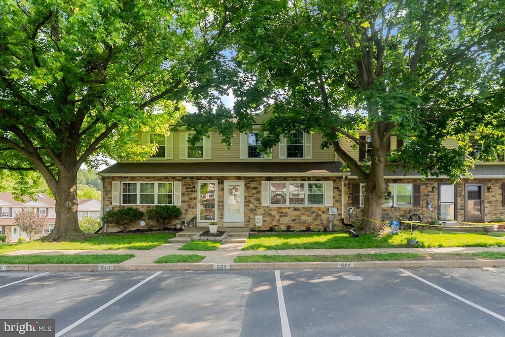 644 Lancaster Ct, Downingtown, PA 19335 - townhome / multi-family property with uncovered parking and a front lawn