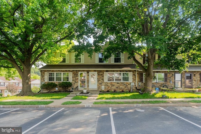 644 Lancaster Ct, Downingtown, PA 19335 - townhome / multi-family property with uncovered parking and a front lawn