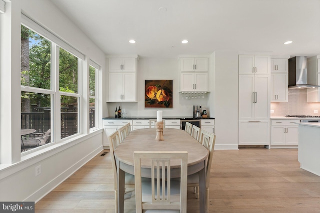 3546 Sutton Heights Cir, Fairfax, VA 22031 - dining space with recessed lighting, light wood-style flooring, and wine cooler