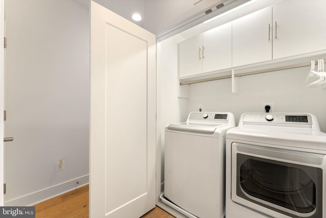 3546 Sutton Heights Cir, Fairfax, VA 22031 - laundry area with washer and clothes dryer and light wood-type flooring
