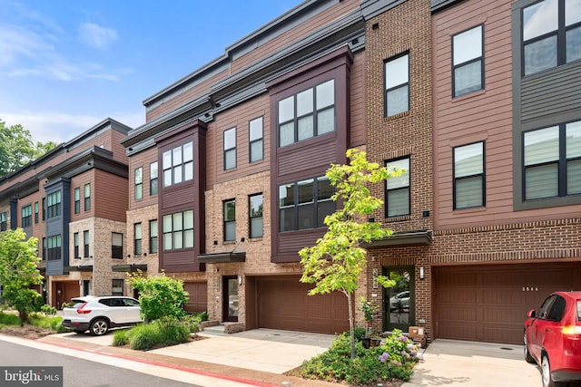 3546 Sutton Heights Cir, Fairfax, VA 22031 - view of building exterior featuring an attached garage and driveway