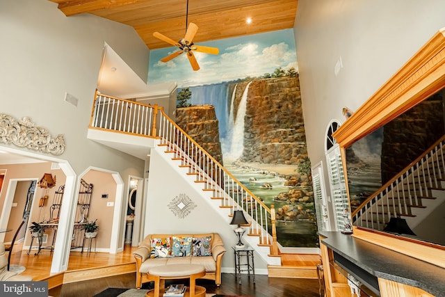 1217 Tullamore Cir, Chester Springs, PA 19425 - staircase with a towering ceiling, hardwood / wood-style floors, a ceiling fan, wooden ceiling, and arched walkways