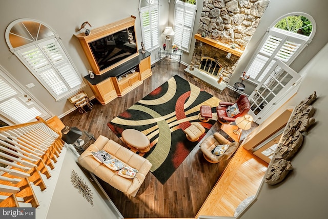 1217 Tullamore Cir, Chester Springs, PA 19425 - living area featuring a stone fireplace and wood finished floors