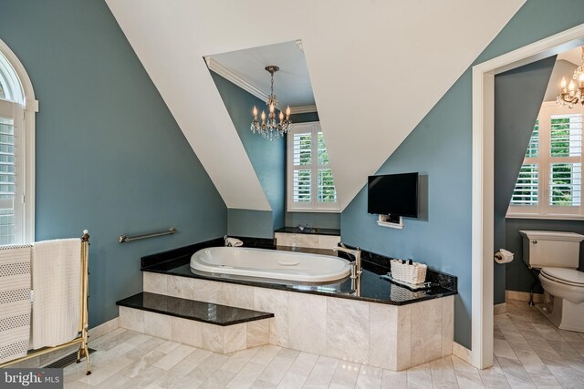 1217 Tullamore Cir, Chester Springs, PA 19425 - bathroom with a chandelier, a garden tub, and healthy amount of natural light