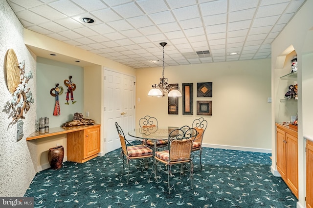 1217 Tullamore Cir, Chester Springs, PA 19425 - dining area with carpet flooring, a chandelier, and a paneled ceiling