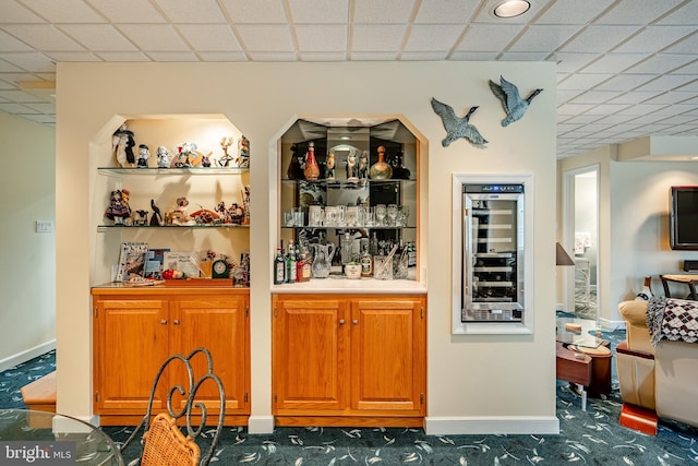 1217 Tullamore Cir, Chester Springs, PA 19425 - indoor dry bar featuring wine cooler, a paneled ceiling, and carpet