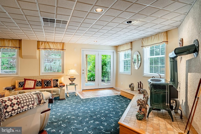 1217 Tullamore Cir, Chester Springs, PA 19425 - carpeted living area featuring a wood stove