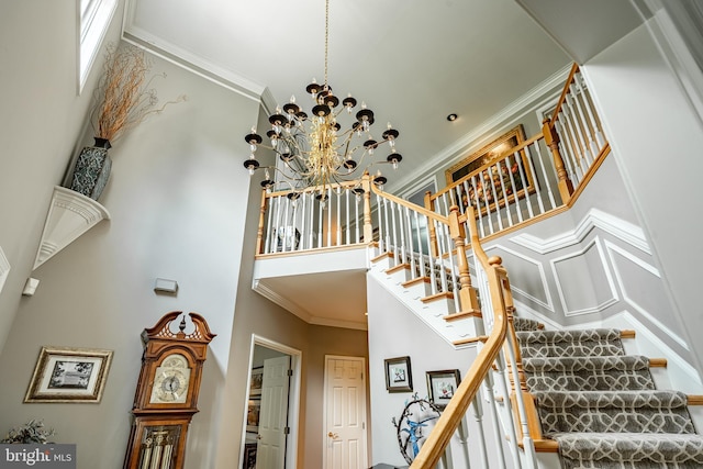 1217 Tullamore Cir, Chester Springs, PA 19425 - stairway with a towering ceiling, crown molding, and a chandelier
