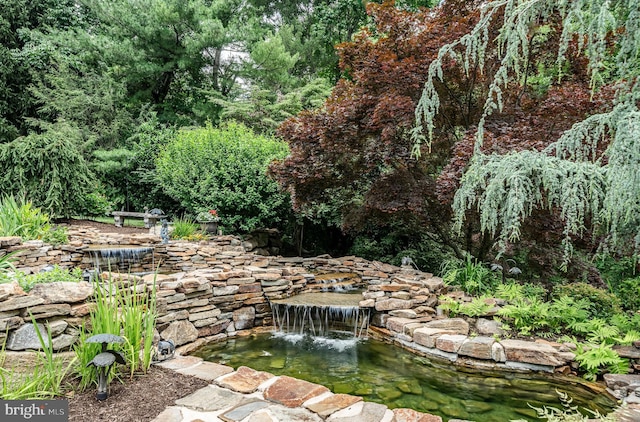 1217 Tullamore Cir, Chester Springs, PA 19425 - view of yard with a garden pond