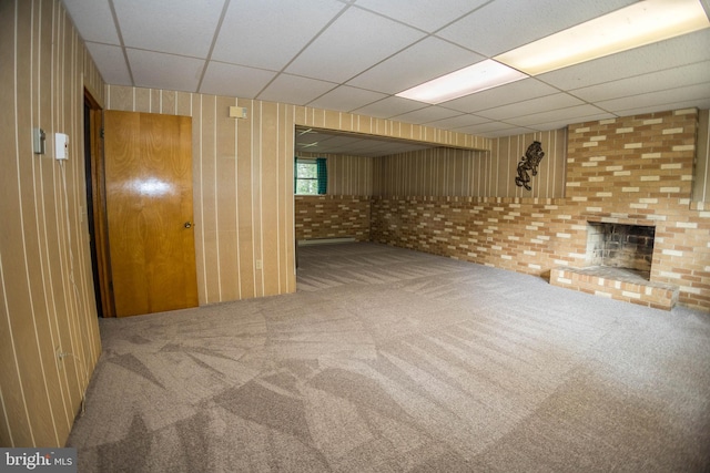 529 Appalachian Ave, Mechanicsburg, PA 17055 - below grade area featuring a paneled ceiling, carpet floors, a fireplace, and wooden walls