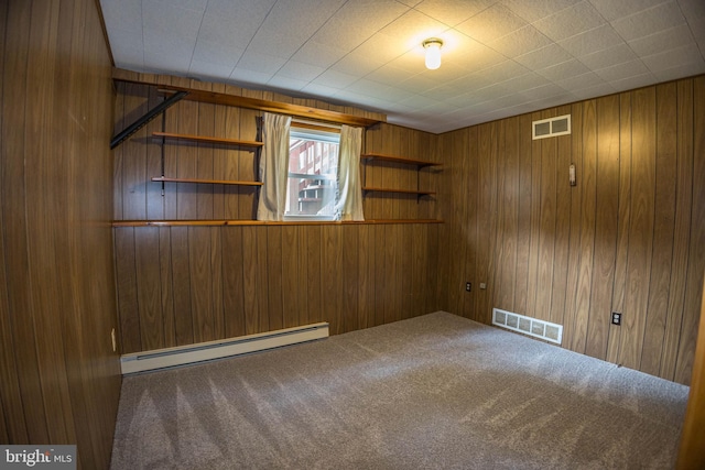 529 Appalachian Ave, Mechanicsburg, PA 17055 - unfurnished room featuring baseboard heating, carpet floors, and wood walls