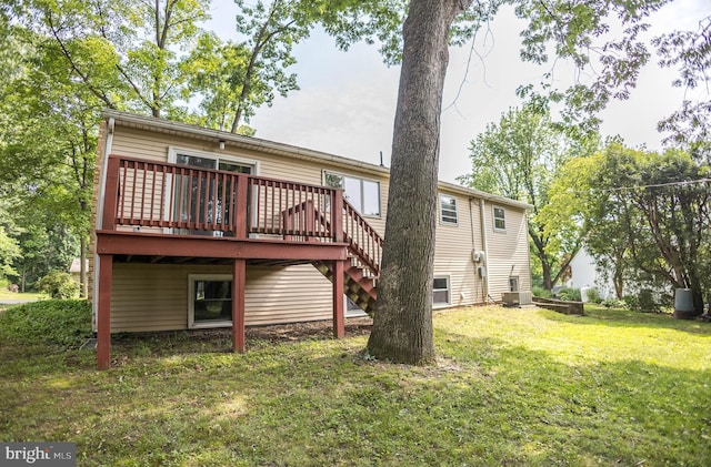 529 Appalachian Ave, Mechanicsburg, PA 17055 - rear view of property featuring a wooden deck, a lawn, and stairway