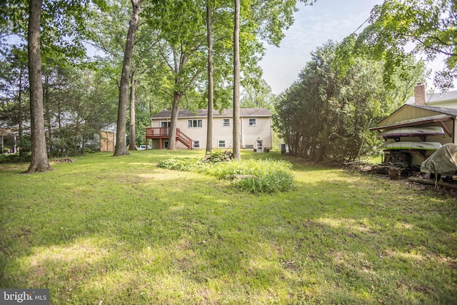 529 Appalachian Ave, Mechanicsburg, PA 17055 - view of grassy yard featuring stairs and a wooden deck